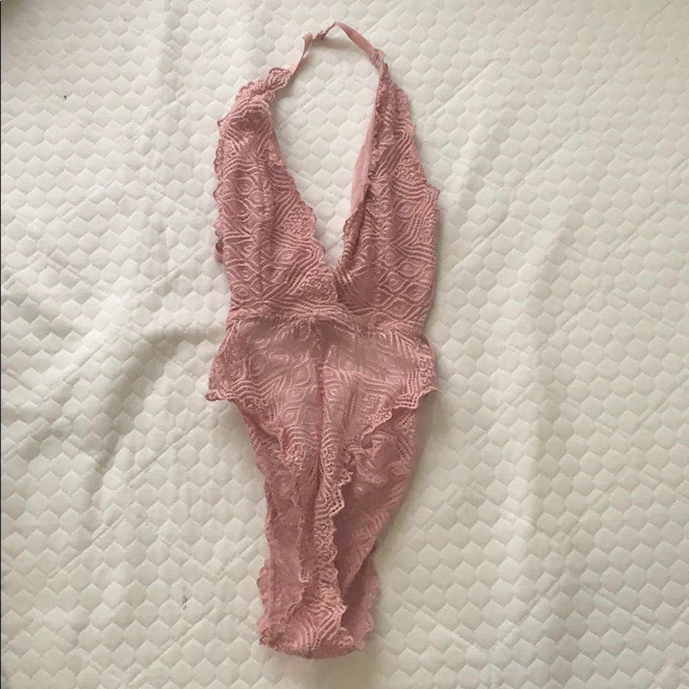 Pink lace body suit